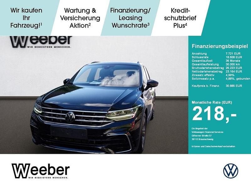 Deep black perleffekt (metallic) Gebraucht 2023 VW Tiguan R-line SUV | 30.885 € (Superpreis) - Bild 1/4