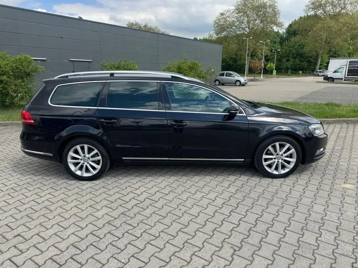 Second-hand VW Passat Highline 160 CP (117 kW) 2012 Negru Break