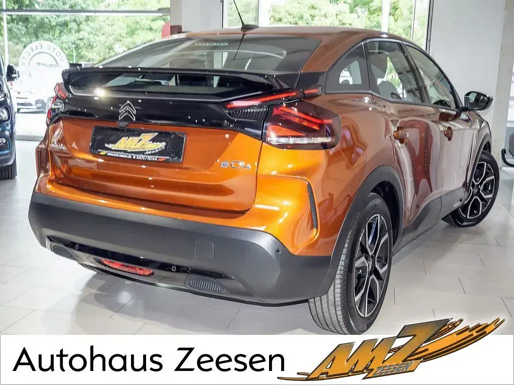 Gebraucht Citroën e-C4 Feel 100 kW (136 PS) 2022 Karamellbraun (metallic) Limousine