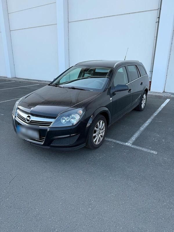 Gebraucht Opel Astra 116 PS (85 kW) 2010 Schwarz Kombi