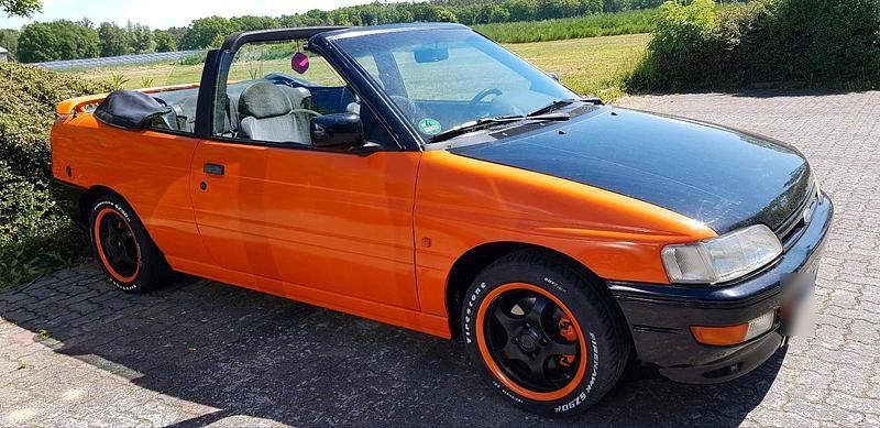 Gebraucht Ford Escort Cabriolet 131 PS (96 kW) 1991 Orange Cabrio