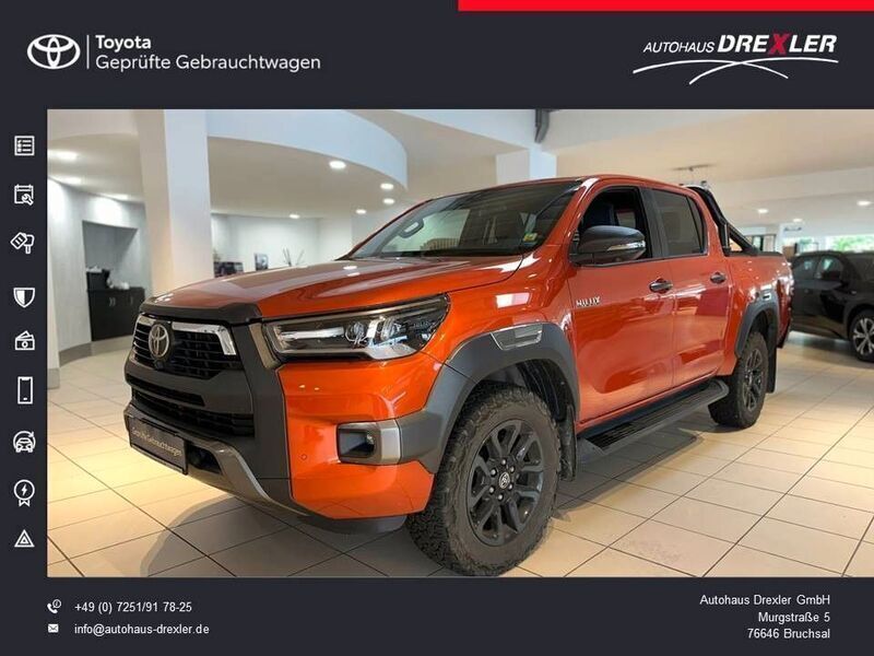 Infernoorange metallic Gebraucht 2022 Toyota HiLux Abholung | 48.490 € (Fairer Preis) - Bild 1/4