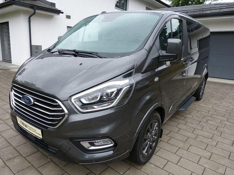 Magneticgrau (metallic) Gebraucht 2020 Ford Tourneo Titanium Van / Kleinbus | 37.599 € (Etwas zu teuer) - Bild 1/4