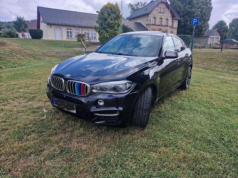 Schwarz Gebraucht 2014 BMW X6 M50 Comfort Edition SUV | 24.800 € (Etwas zu teuer) - Bild 1/4