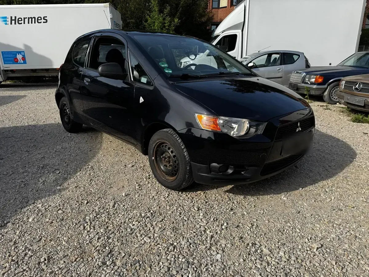 Gebraucht Mitsubishi Space Star 75 PS (55 kW) 2005 Schwarz Kleinwagen