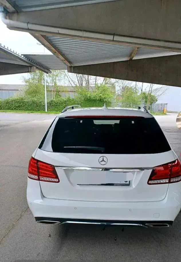 Używany Mercedes E220 170 KM (125 kW) 2014 Biały Kombi