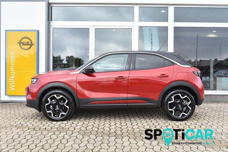 Kosmosrot Gebraucht 2024 Opel Mokka Ultimate SUV | 21.950 € (Fairer Preis) - Bild 1/4