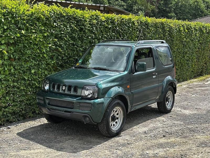 Grün Gebraucht 2006 Suzuki Jimny SUV | 8.490 € (Fairer Preis) - Bild 1/4