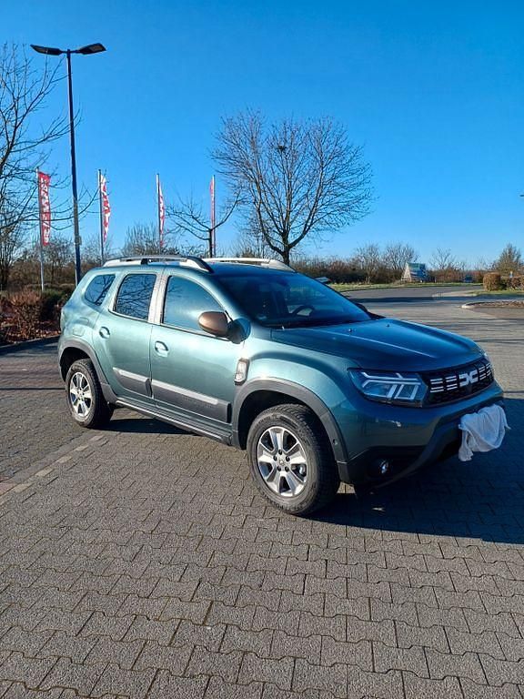 Grün Gebraucht 2023 Dacia Duster Extreme SUV | 19.600 € (Fairer Preis) - Bild 1/4