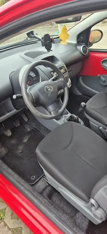 Gebraucht Toyota Aygo 68 PS (50 kW) 2009 Rot Kleinwagen