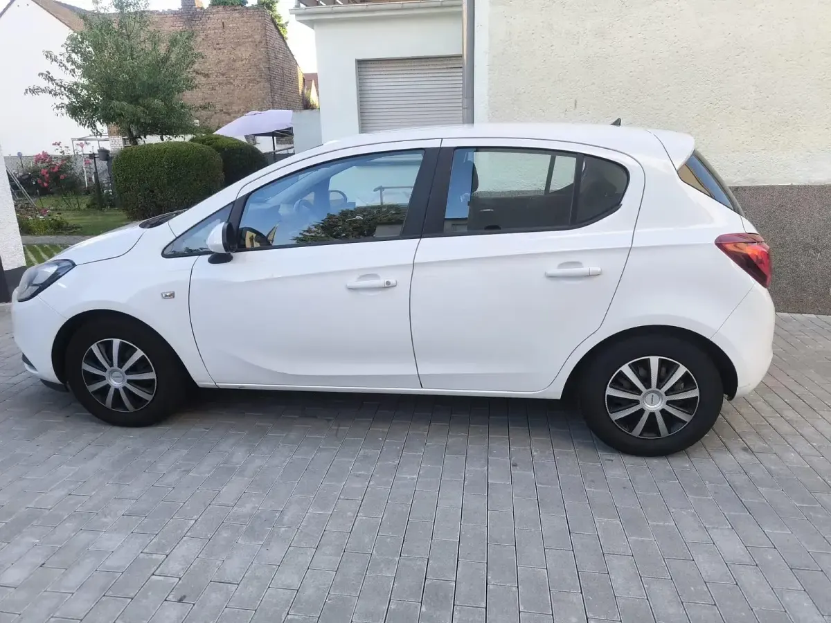 Gebraucht Opel Corsa 90 PS (66 kW) 2015 Weiß Kleinwagen