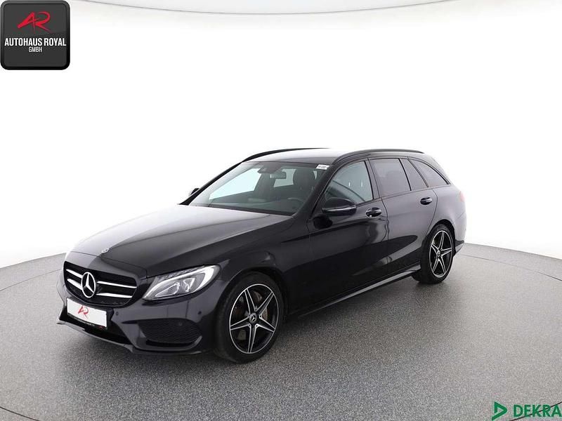 Schwarz (metallic) Gebraucht 2018 Mercedes C250 AMG Kombi | 24.880 € (Fairer Preis) - Bild 1/4