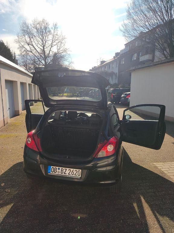 Gebraucht Opel Corsa Active 69 PS (50 kW) 2013 Schwarz Kleinwagen
