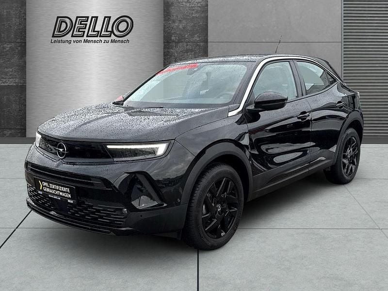 Lackierung schwarz perla nera/ Gebraucht 2024 Opel Mokka Elegance SUV | 21.990 € (Fairer Preis) - Bild 1/4