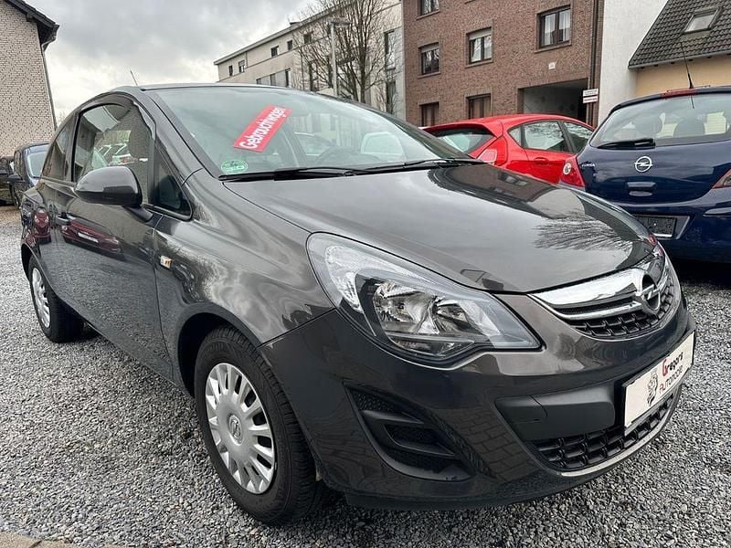 Grau Gebraucht 2014 Opel Corsa Selection Limousine | 5.950 € (Fairer Preis) - Bild 1/4