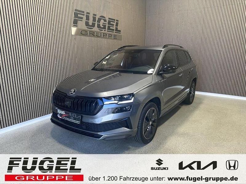 Graphitegrau metallic Gebraucht 2022 Skoda Karoq SportLine SUV | 28.999 € (Fairer Preis) - Bild 1/4