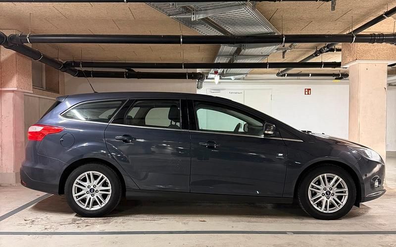 Gebraucht Ford Focus Titanium 116 PS (85 kW) 2013 Blau Kombi