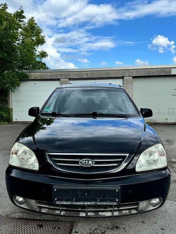 Schwarz Gebraucht 2004 Kia Carens EX Van / Kleinbus | 1.200 € (Superpreis) - Bild 1/4