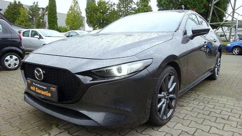 Grau Gebraucht 2019 Mazda 3 Selection Limousine | 19.900 € (Fairer Preis) - Bild 1/4