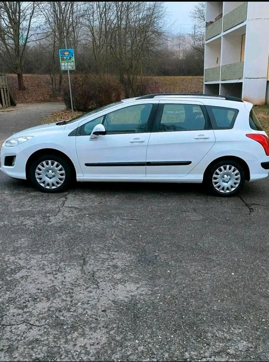 Gebraucht Peugeot 308 105 PS (77 kW) 2012 Weiß Kombi