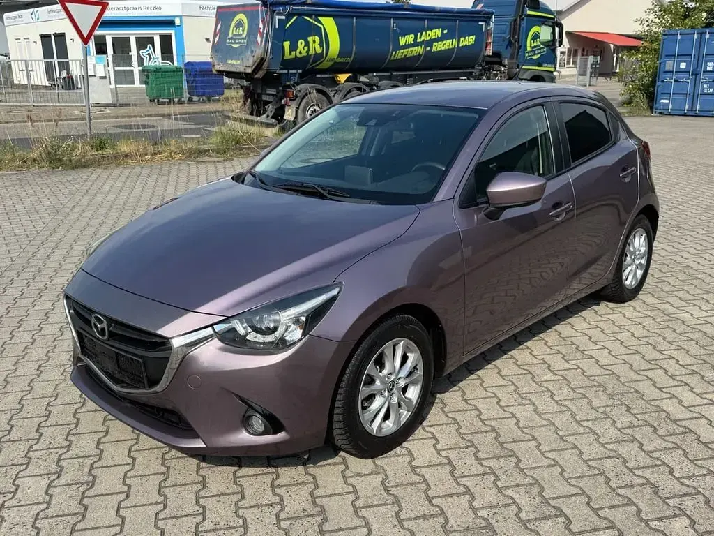 Gebraucht Mazda 2 Exclusive-Line 90 PS (66 kW) 2015 Violett Limousine