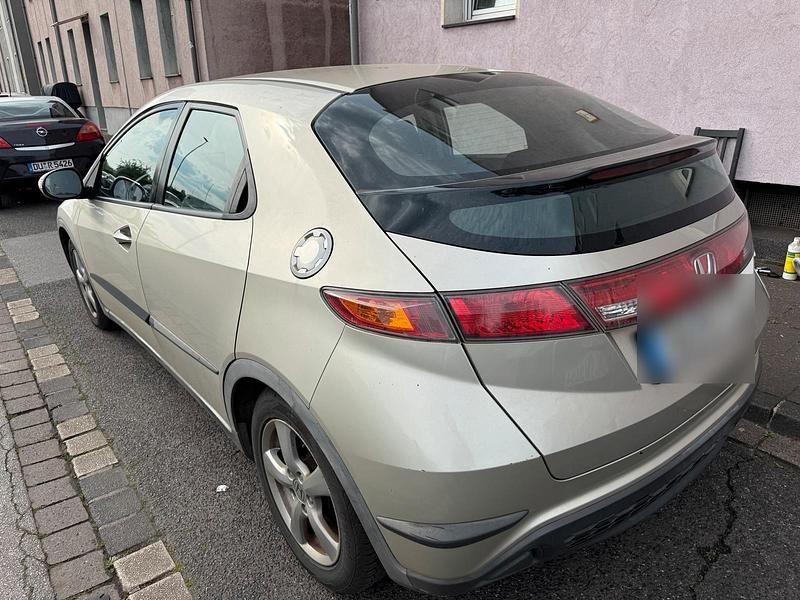 Second-hand Honda Civic 83 CP (61 kW) 2007 Auriu Hatchback