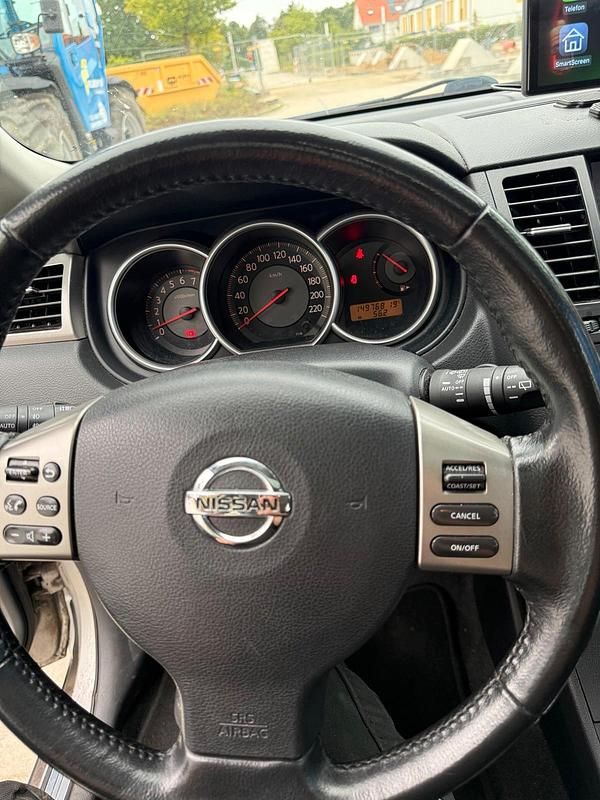 Grau Gebraucht 2009 Nissan Tiida Kleinwagen | 3.450 € (Fairer Preis) - Bild 1/4