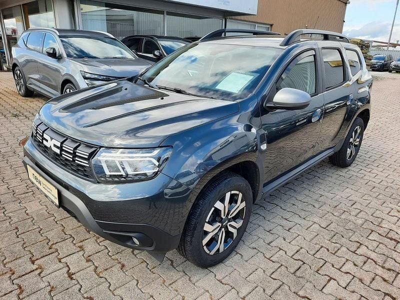 Kometengrau (metallic) Gebraucht 2023 Dacia Duster Journey SUV | 20.990 € (Fairer Preis) - Bild 1/4