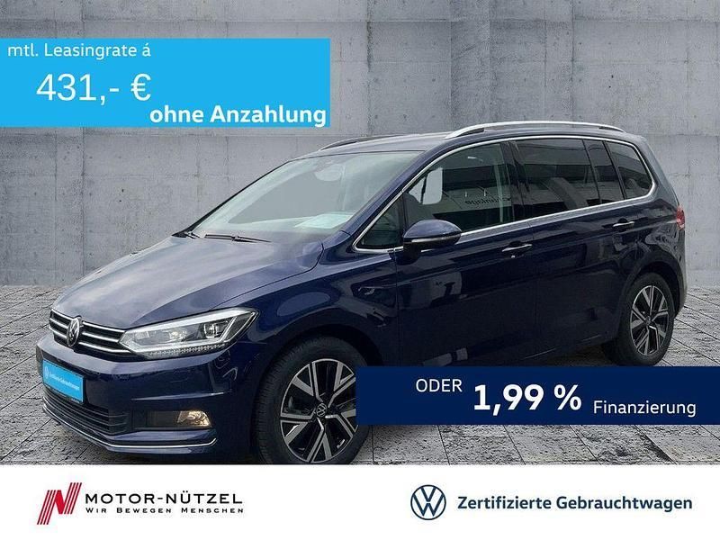 Atlantik blue metallic Gebraucht 2024 VW Touran Highline Van / Kleinbus | 40.630 € (Teuer) - Bild 1/4