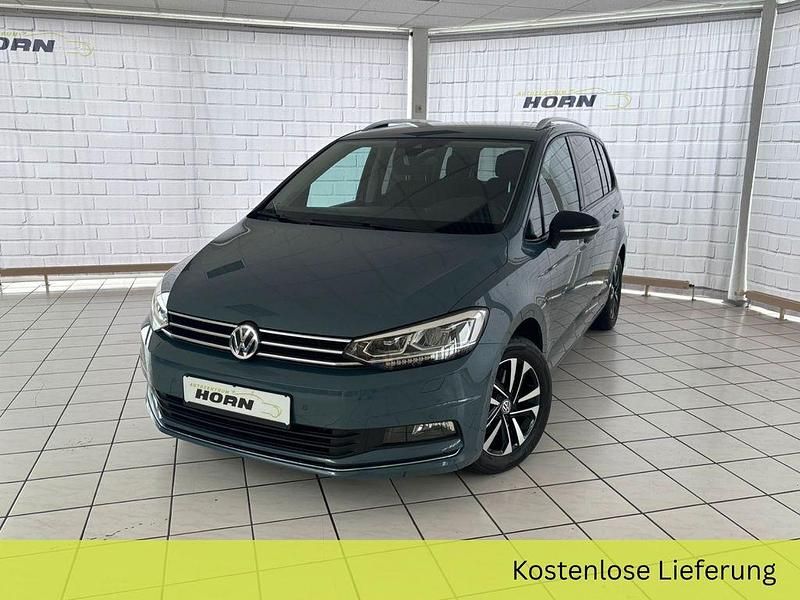 Gebraucht VW Touran 150 PS (110 kW) 2019 Petroleum blue metallic Van / Kleinbus
