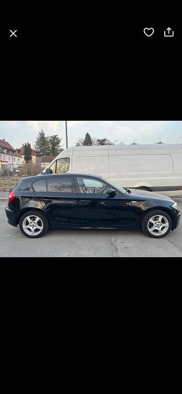 Second-hand BMW 116 122 CP (89 kW) 2009 Negru Hatchback