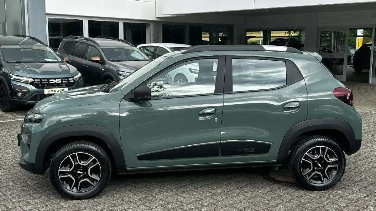 Gebraucht Dacia Spring Essentiel 33 kW (45 PS) 2023 Grün "flechtengrau" Kleinwagen