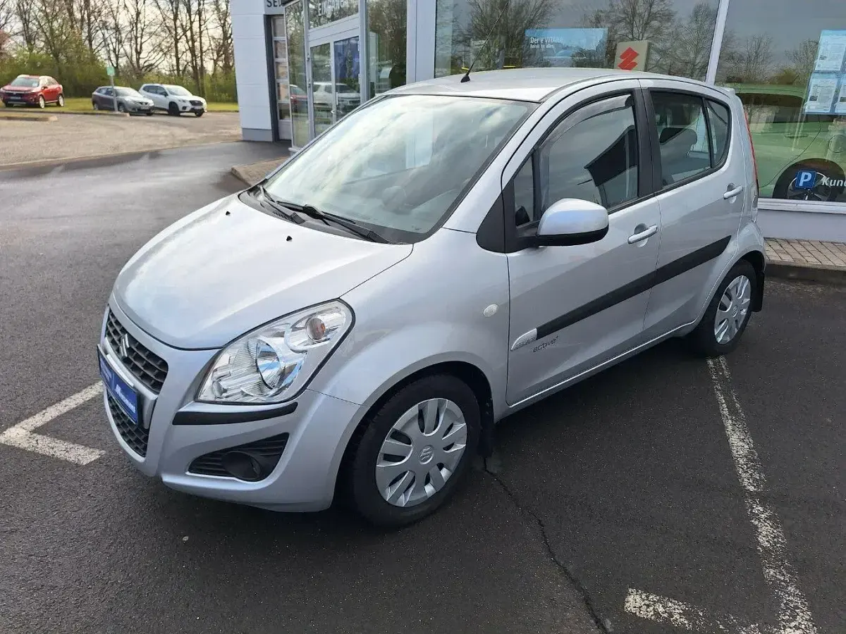 Gebraucht Suzuki Splash Active+ 94 PS (69 kW) 2015 Silky silver met. Kleinwagen