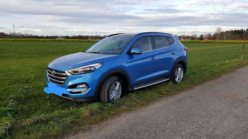 Blau Gebraucht 2015 Hyundai Tucson Premium SUV | 14.999 € (Guter Preis) - Bild 1/4
