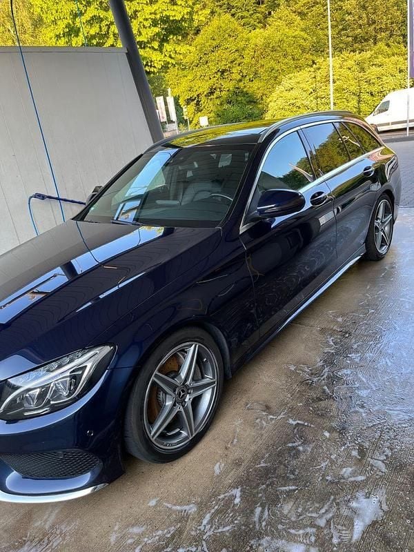 Blau Gebraucht 2015 Mercedes C250 AMG line Kombi | 16.300 € (Guter Preis) - Bild 1/4