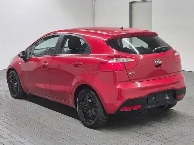 Gebraucht Kia Rio EX 86 PS (63 kW) 2013 Signal red (metallic) Kleinwagen