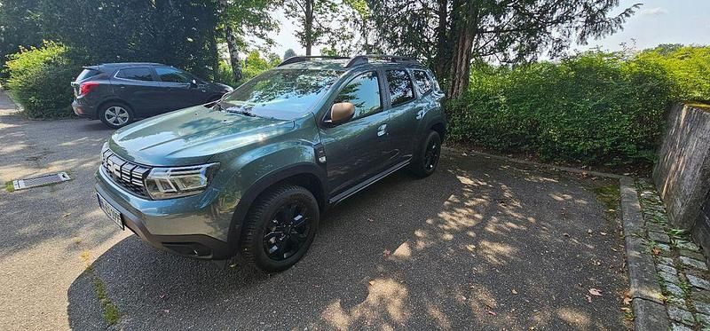 Grün Gebraucht 2024 Dacia Duster Extreme SUV | 24.500 € (Fairer Preis) - Bild 1/4