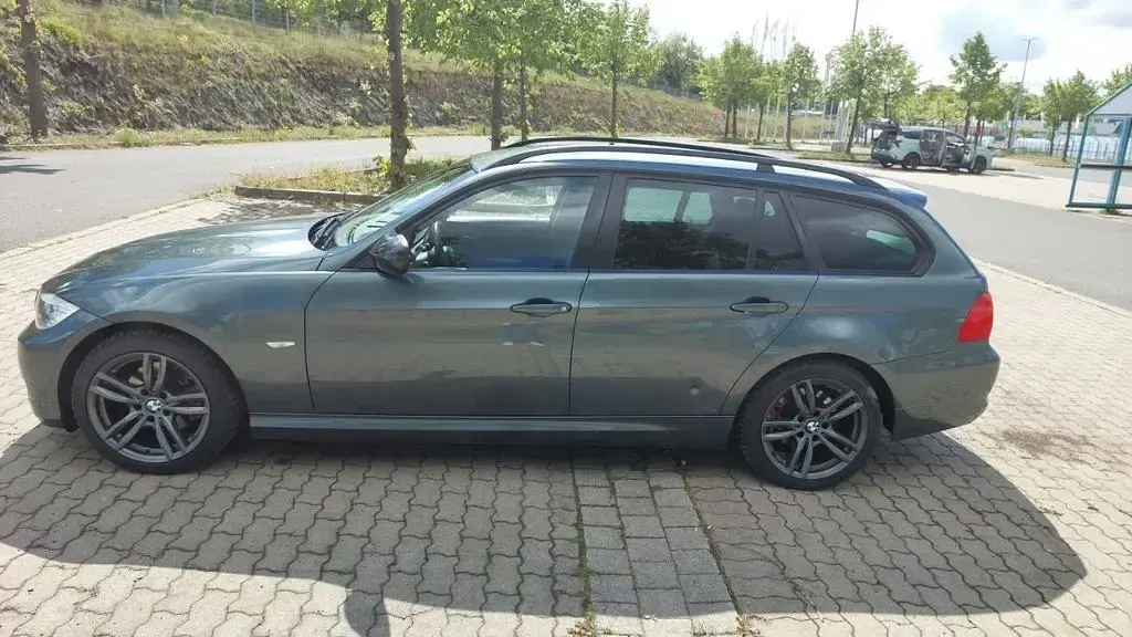 Gebraucht BMW 318 143 PS (105 kW) 2009 Grün Kombi