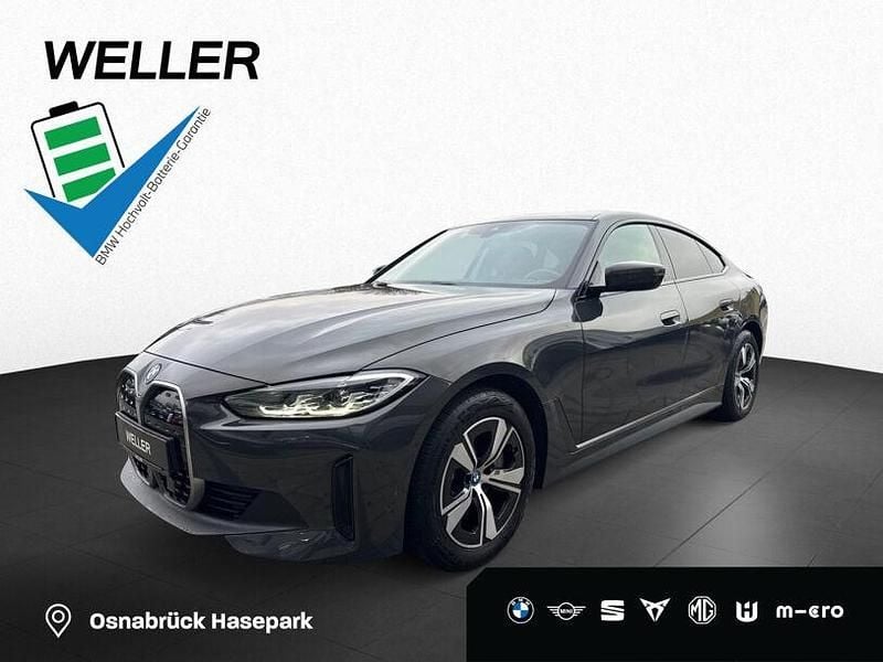 Dravitgrau (grau) Gebraucht 2022 BMW i4 Comfort Edition Limousine | 36.910 € (Fairer Preis) - Bild 1/3