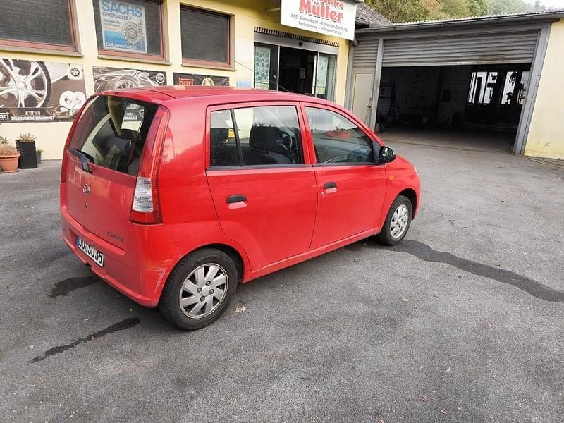 Gebraucht Daihatsu Cuore 58 PS (42 kW) 2005 Rot Kleinwagen