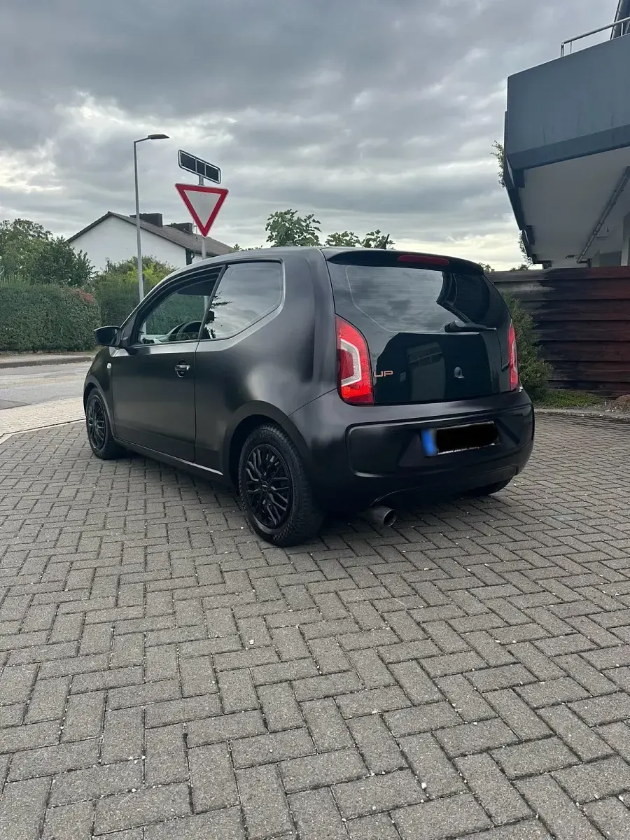 Używany VW up! 60 KM (44 kW) 2014 Czarny Hatchback