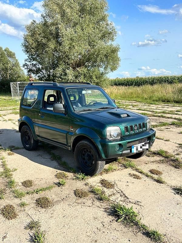 Grün Gebraucht 2004 Suzuki Jimny SUV | 9.690 € - Bild 1/4