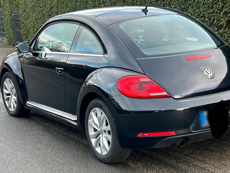 Gebraucht VW Beetle 105 PS (77 kW) 2011 Schwarz Kleinwagen