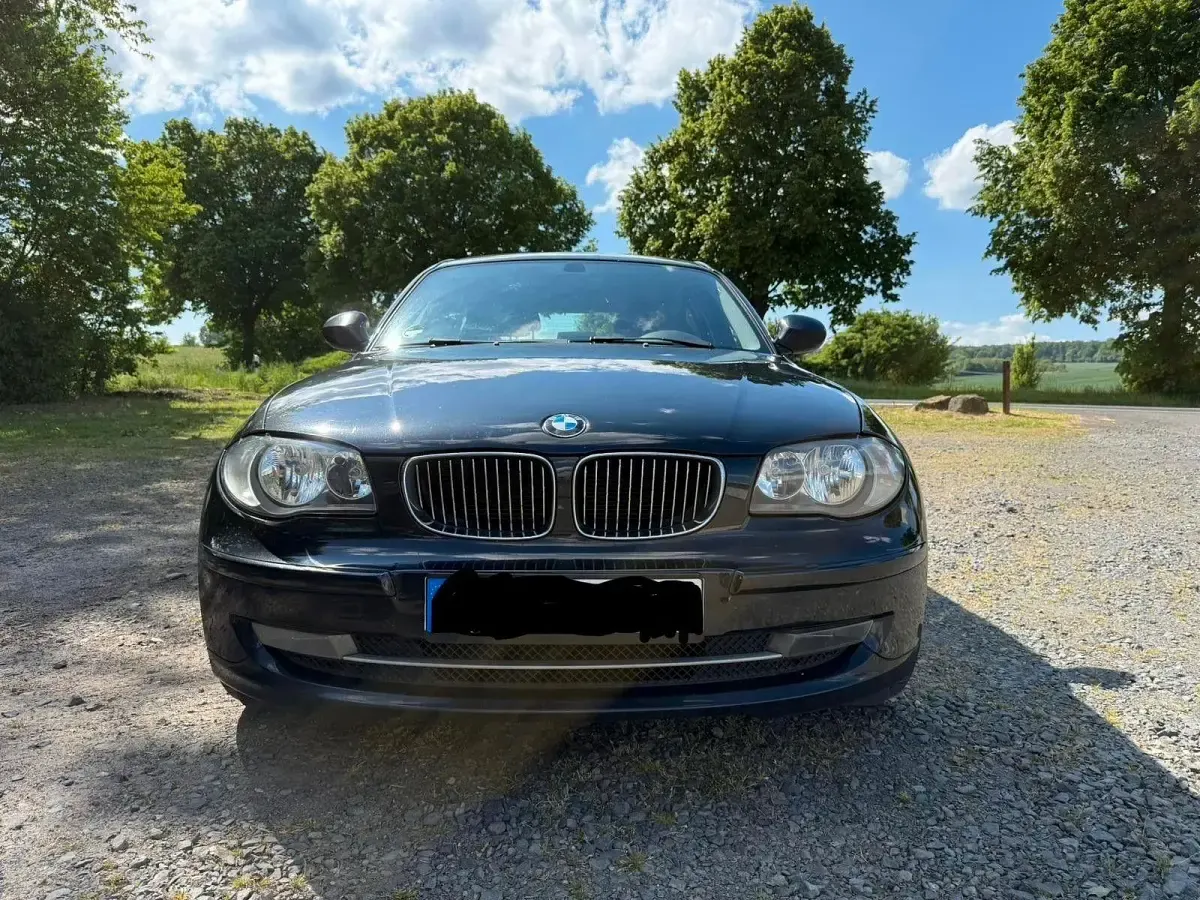 Używany BMW 116 Advantage 122 KM (89 kW) 2010 Czarny Hatchback