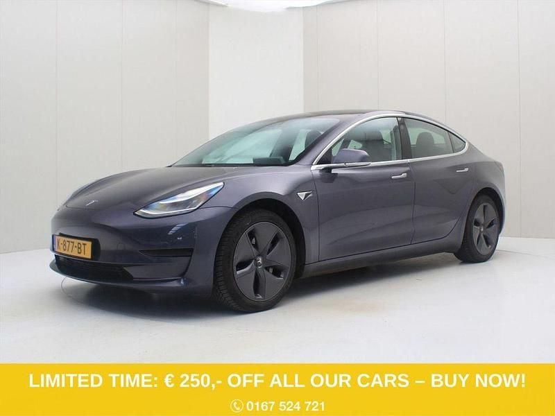 Grau Gebraucht 2020 Tesla Model 3 Standard Range Limousine | 18.400 € (Fairer Preis) - Bild 1/4