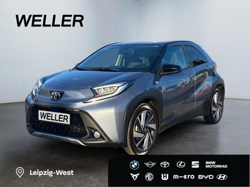 Grau Gebraucht 2024 Toyota Aygo X-plore Kleinwagen | 18.990 € (Fairer Preis) - Bild 1/3