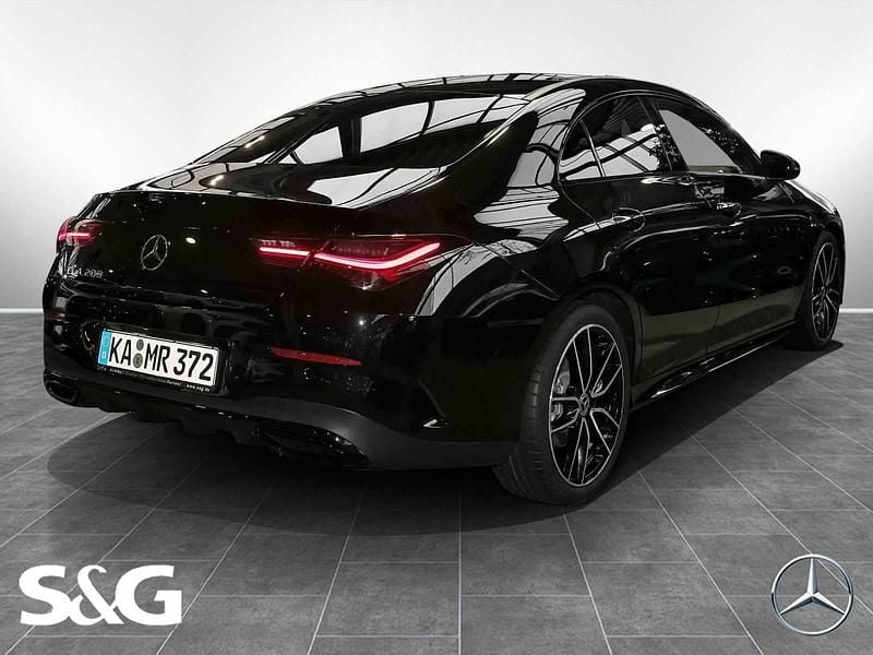 Gebraucht Mercedes CLA200 AMG 163 PS (119 kW) 2025 Metalliclack kosmosschwarz Coupé