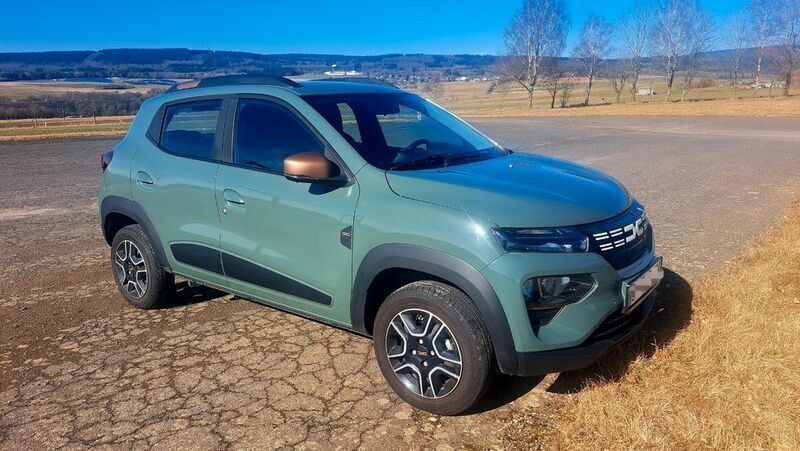 Grün Gebraucht 2023 Dacia Spring Extreme Kleinwagen | 13.390 € (Superpreis) - Bild 1/4