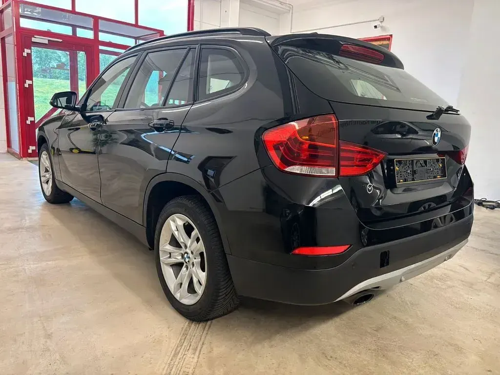Second-hand BMW X1 150 CP (110 kW) 2014 Negru SUV
