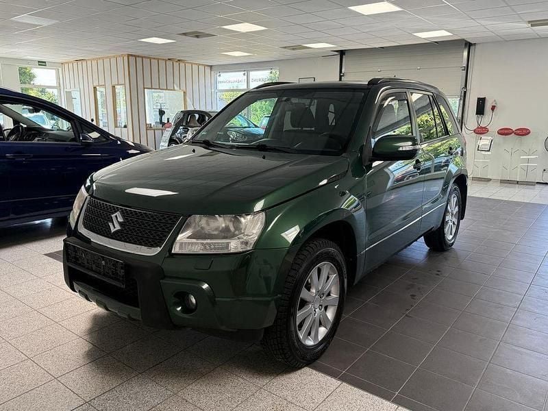 Grün Gebraucht 2009 Suzuki Grand Vitara SUV | 7.100 € (Teuer) - Bild 1/4